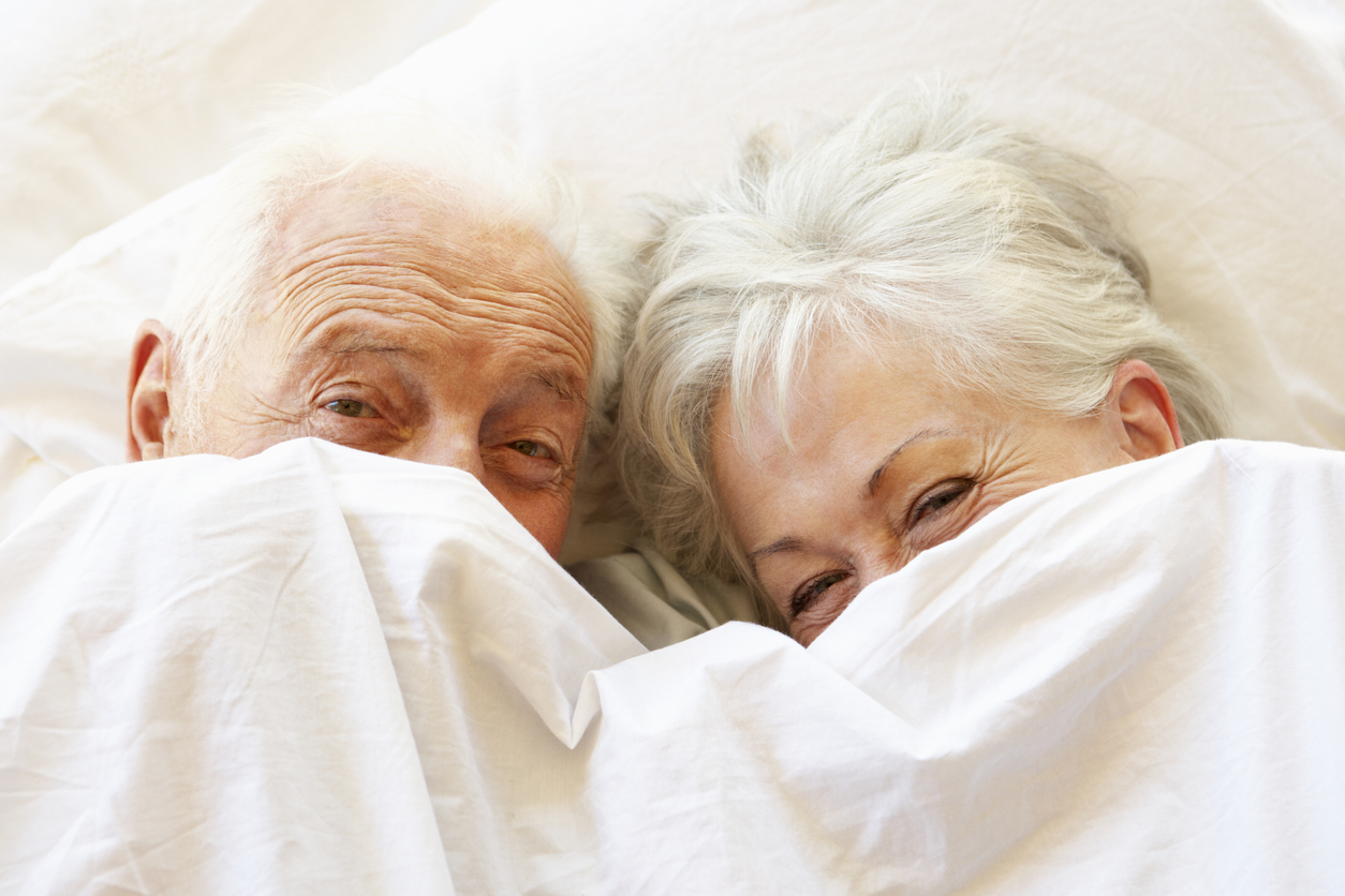 Seniors in bed